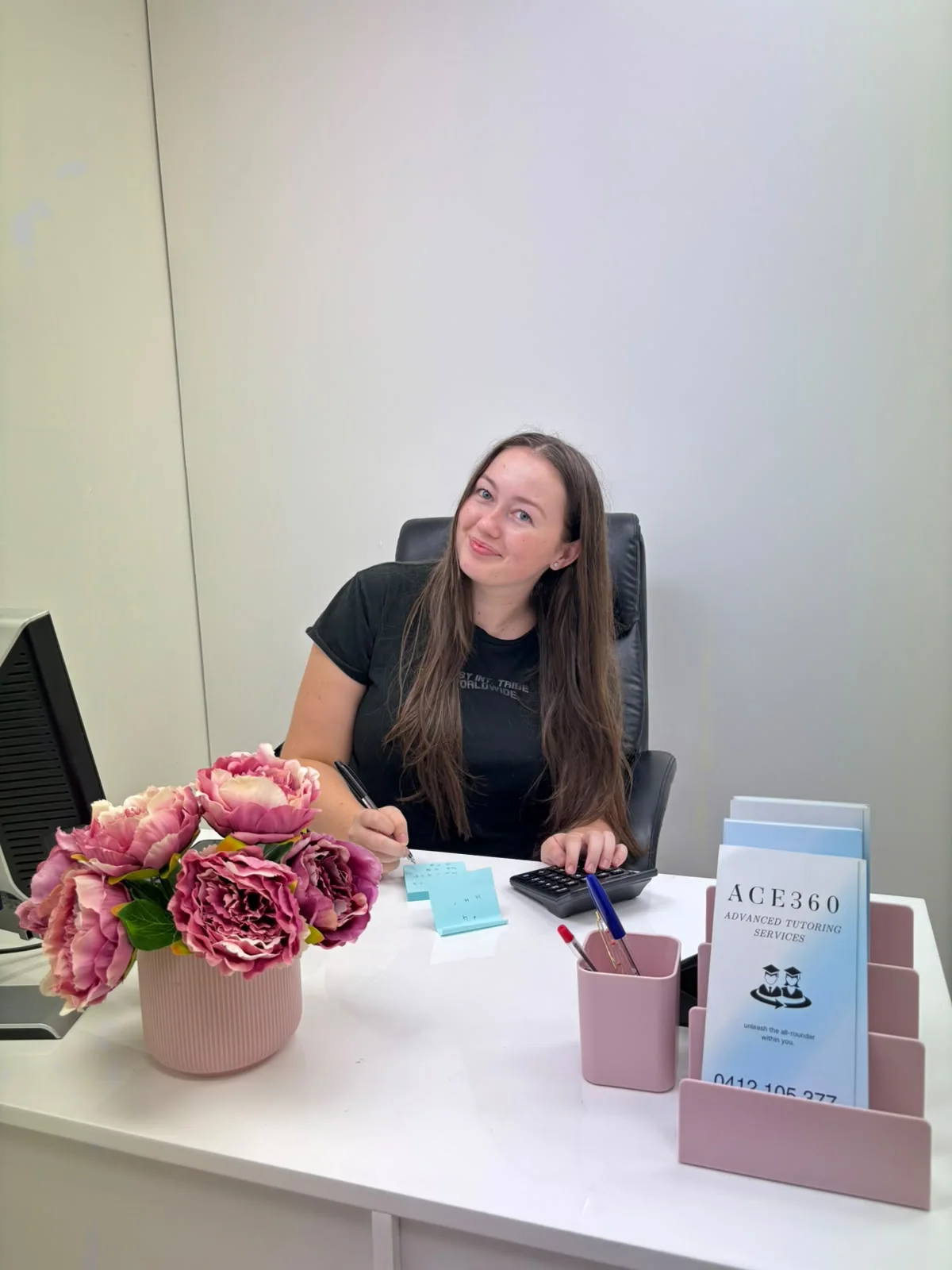 ACE360 team member at the reception desk