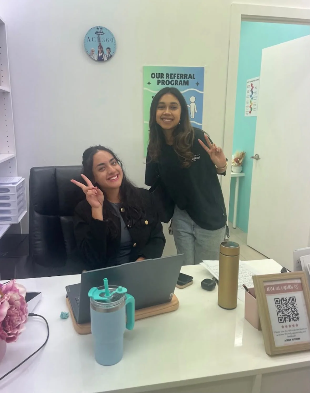 Two ACE360 team members at the tutoring centre